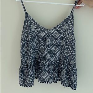 Blue and white patterned peplum top from Lush